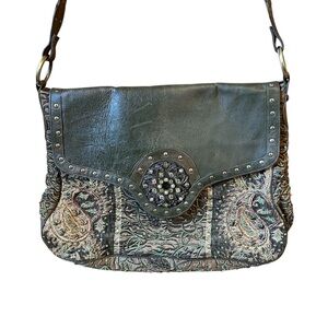 Vintage Christiana beaded leather saddle bag